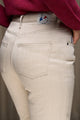 Jeans en lin Condate couleur naturelle, coupe droite et taille mi-haute, avec fermeture à glissière, tissage en sergé croisé, poids 380g/m2, 100% lin de Normandie sans teinture, vue de dos montrant les poches et l'étiquette Le Gaulois jeans - fabrication française
